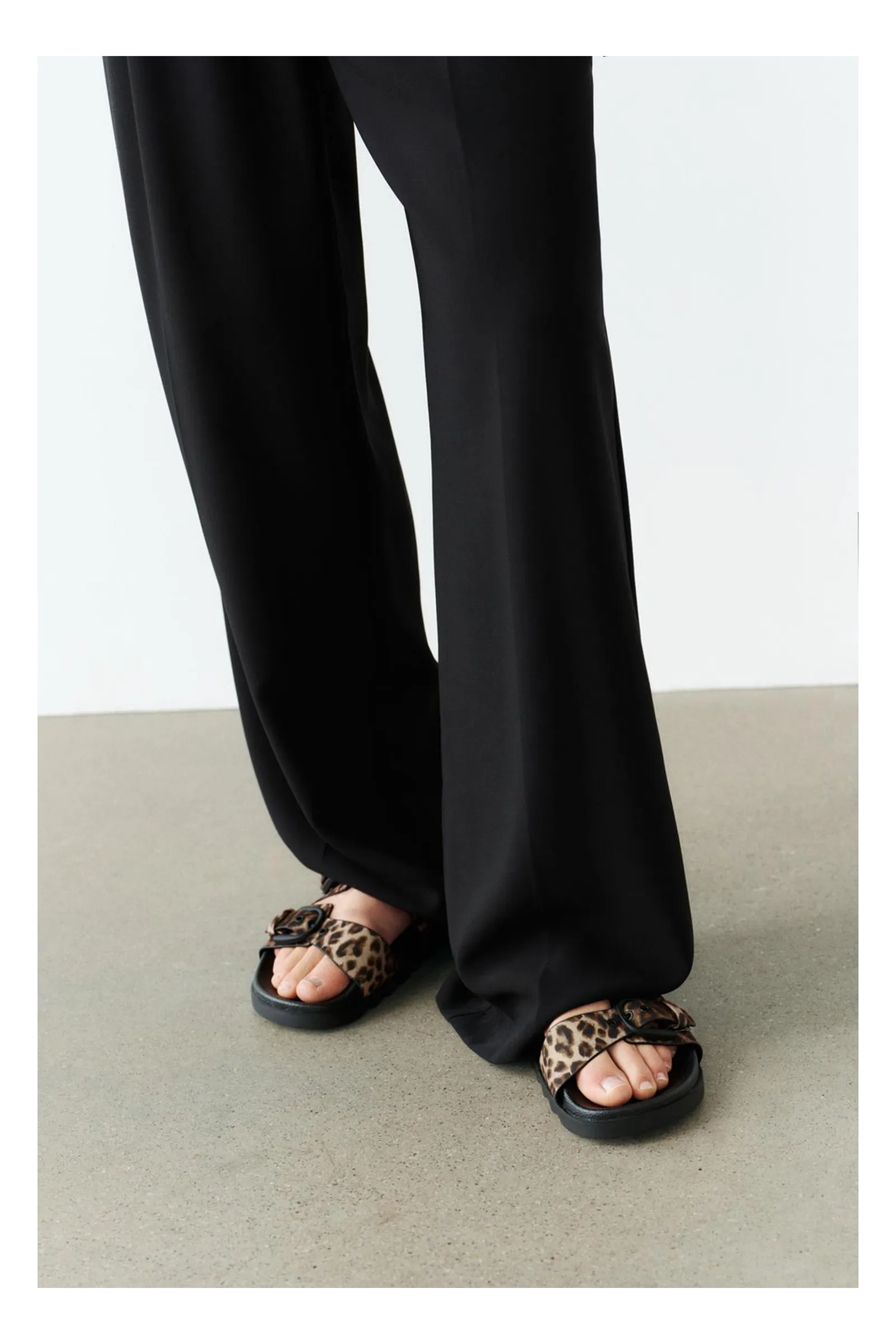 Buckeled Flat Slider Sandals